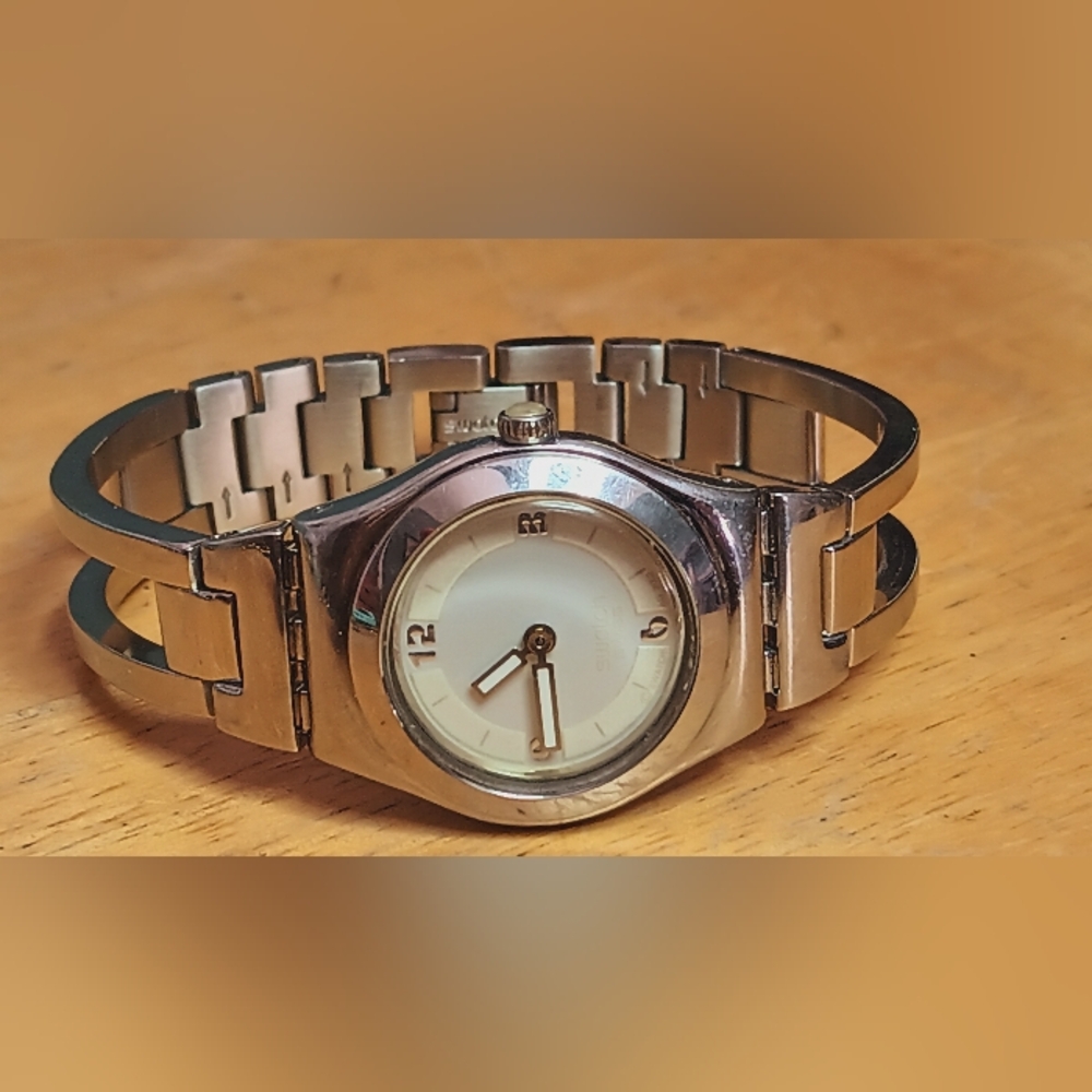 X Swatch Irony SS, case Cream colored dial Silver Arabic numerals 2 hand
